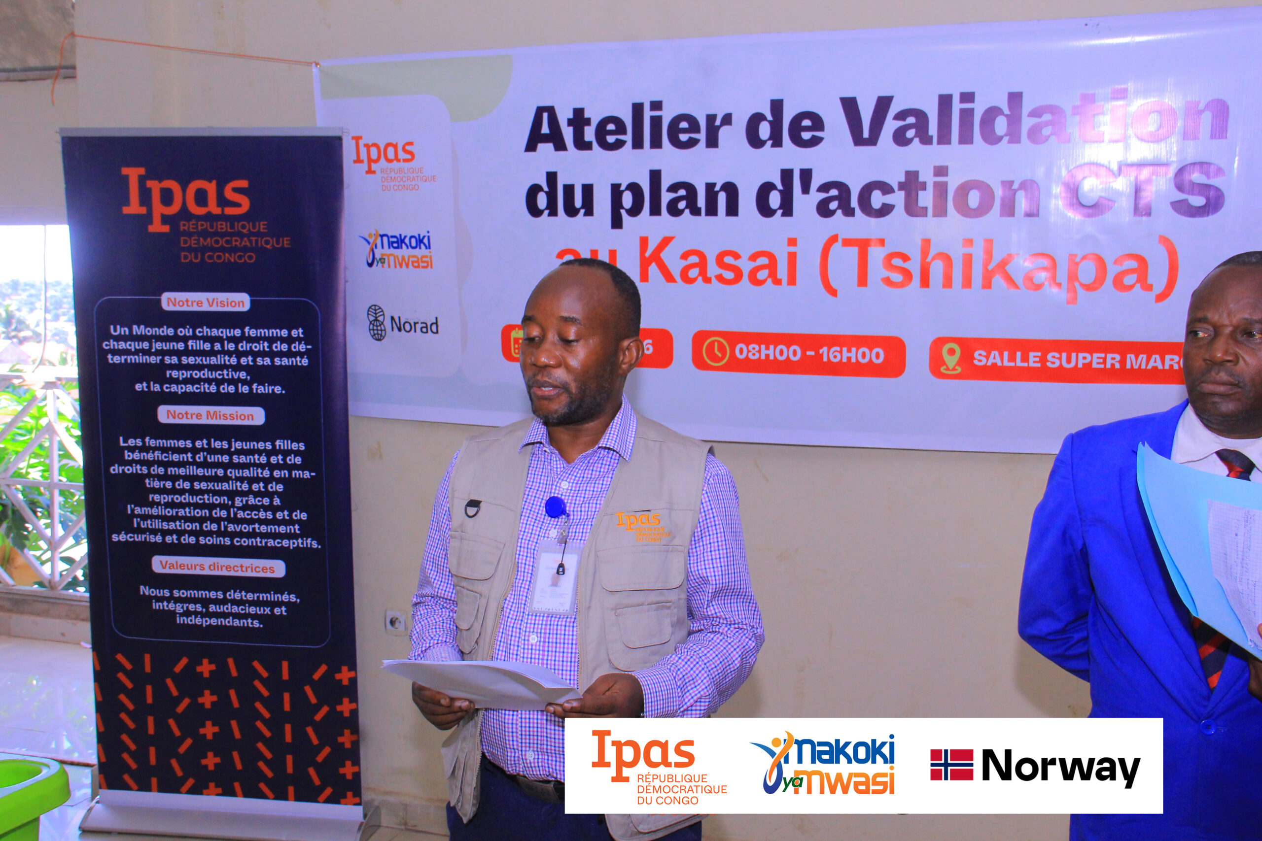 Woman carrying drinks on her head.